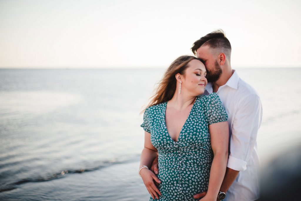 couple getting engagement photos done at Tiscornia Park in St Joseph Michigan. Photos by Westley Leon Studios
