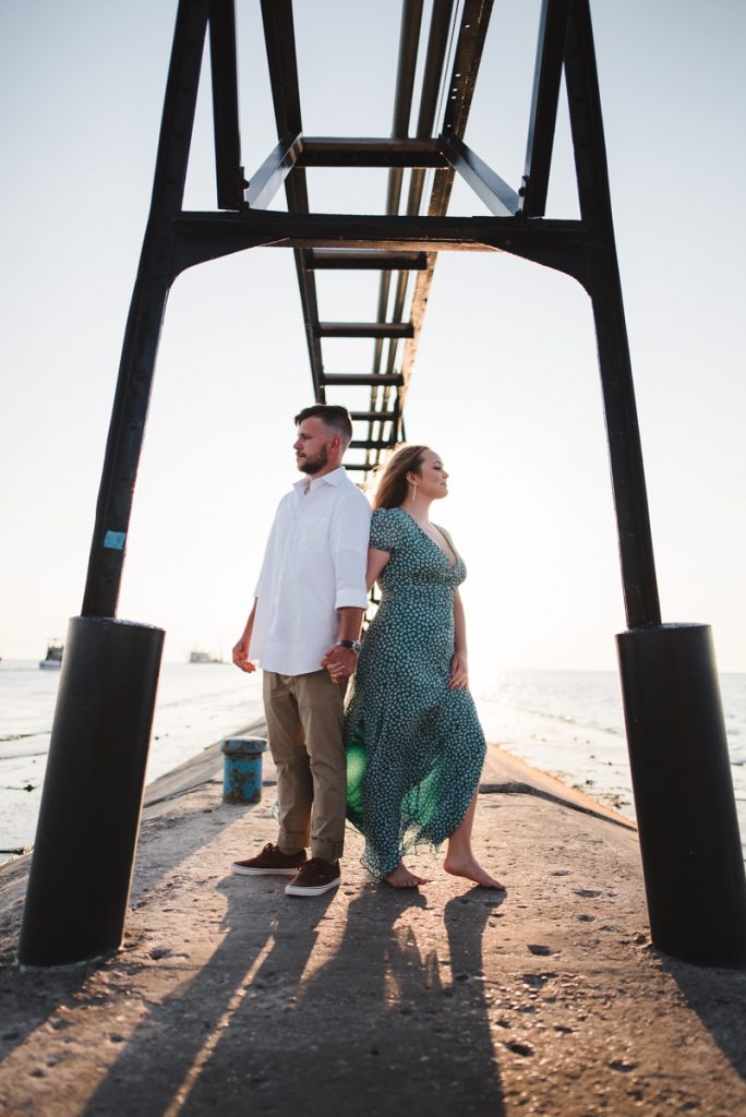 couple getting engagement photos done at Tiscornia Park in St Joseph Michigan. Photos by Westley Leon Studios