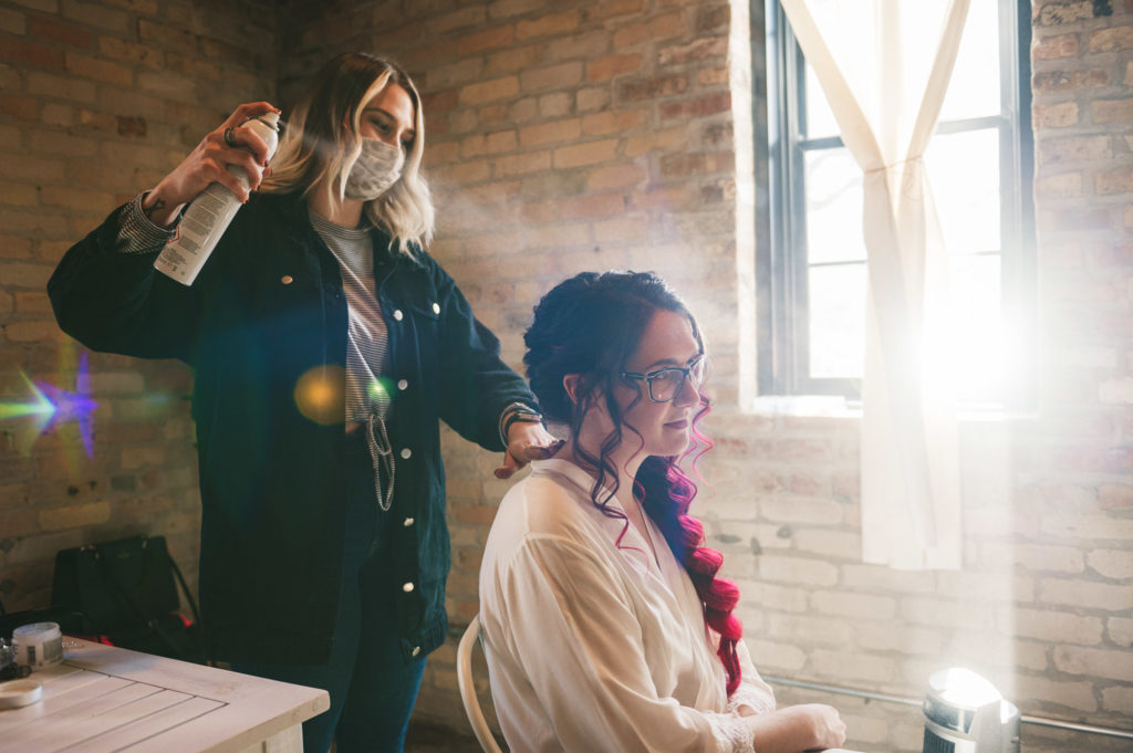 bride getting hair done Westley Leon Studios Wedding Photography Barrelhouse at Zorn in Michigan City