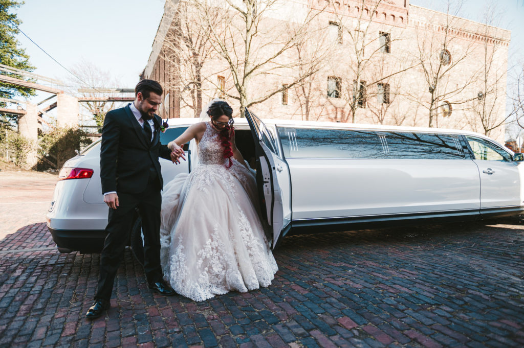 bride and groom arriving at reception in limo Westley Leon Studios Wedding Photography Barrelhouse at Zorn in Michigan City