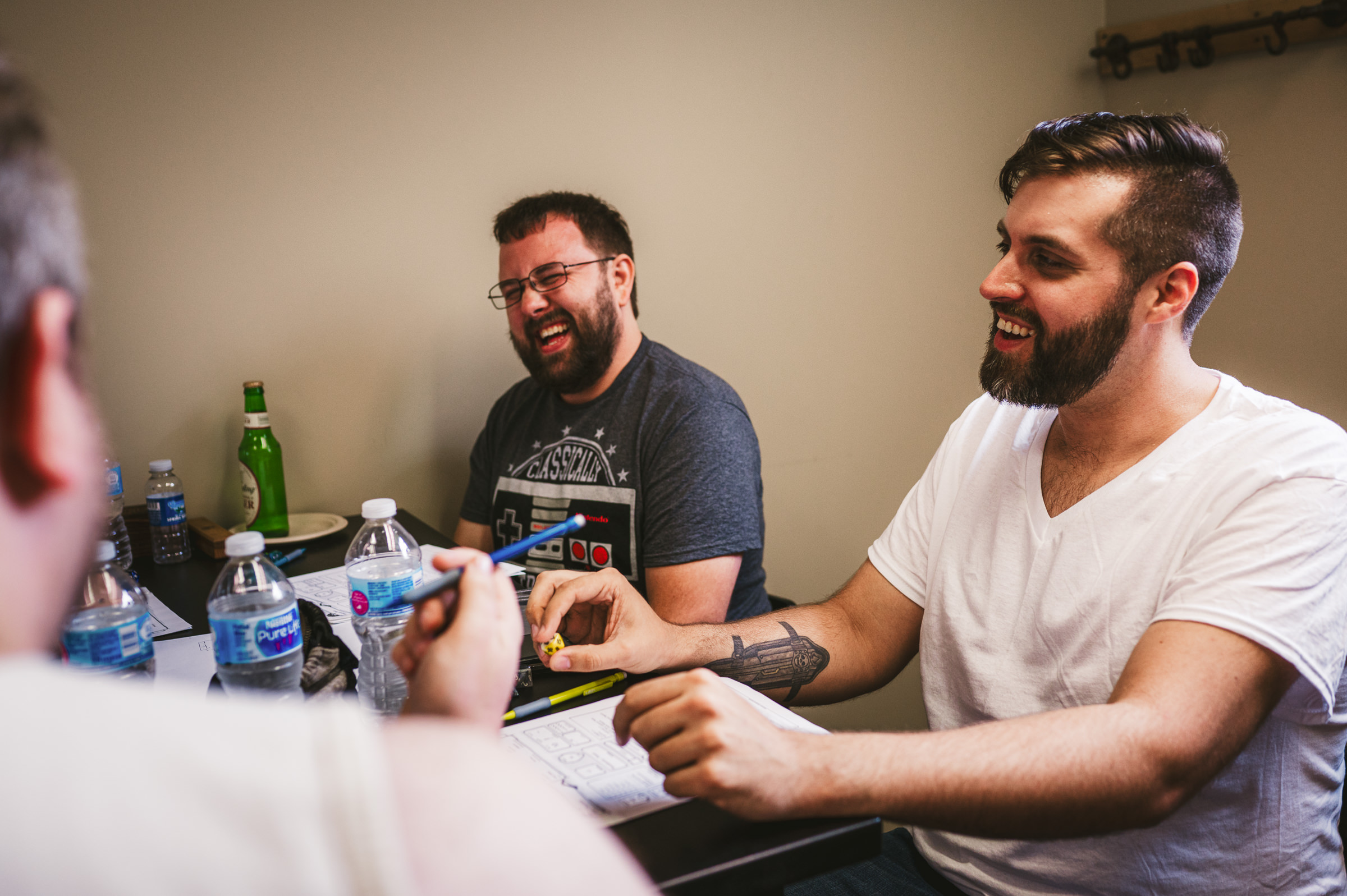 groom and groomsmen playing dungeons and dragons wedding photographer Westley Leon Studios at Heston Hills Event Center wedding venue La Porte Indiana