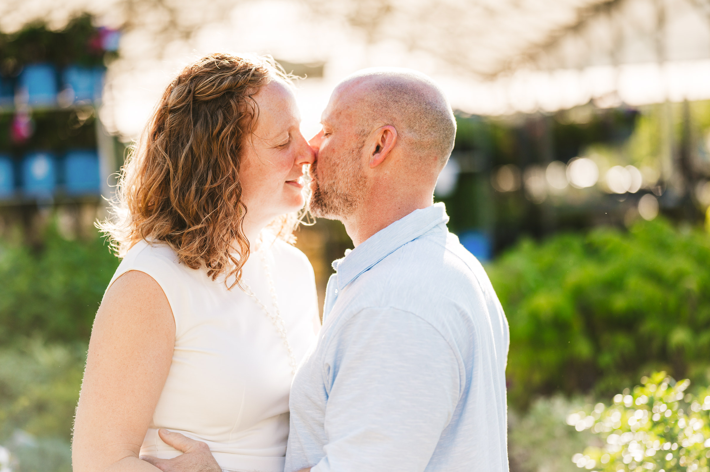 couple almost kissing in garden department Westley Leon Studios Wedding Photographer Lowe's Home Improvement in Mishawaka Indiana